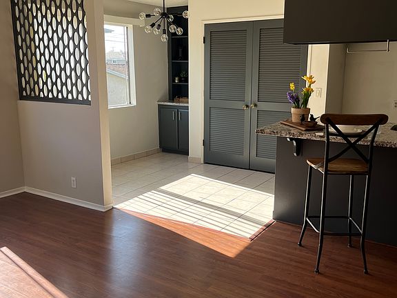 Cozy yet spacious kitchen, with countertop seating plus space for an eat in area.