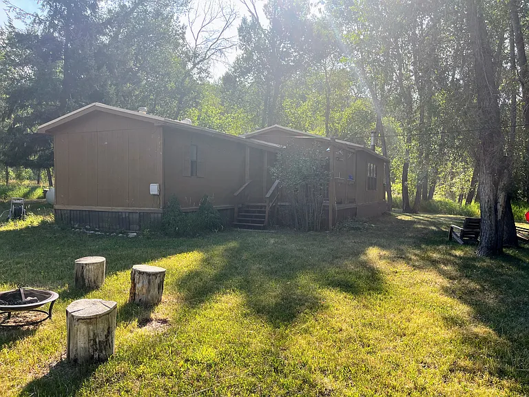 exterior - back/side yard in summer