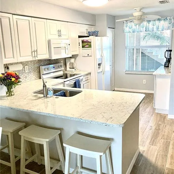 6750 Huntington Lakes Cir #103 — Photo 2