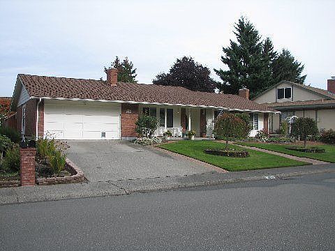 Large Driveway, Garage is Finished from Floor to Ceiling