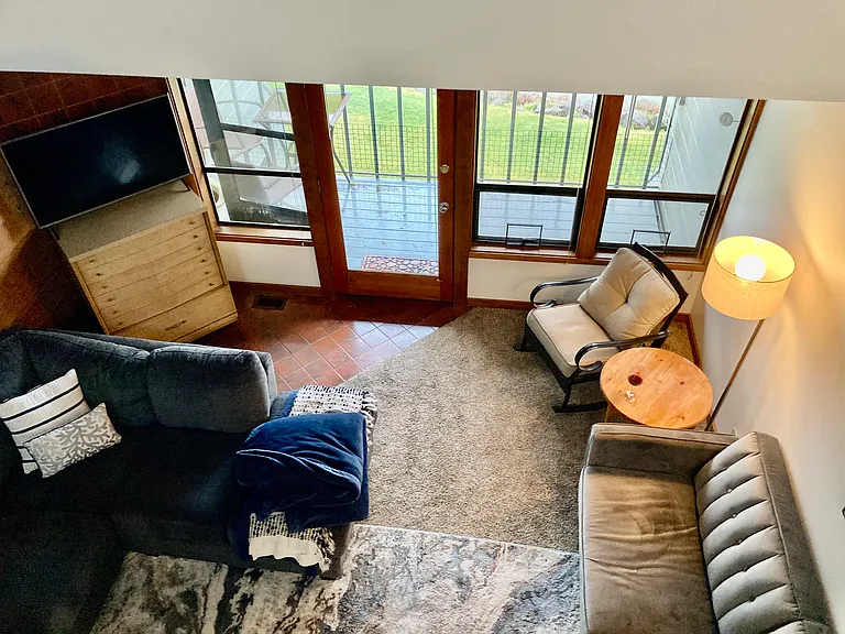 Loft bedroom overlooks livingroom