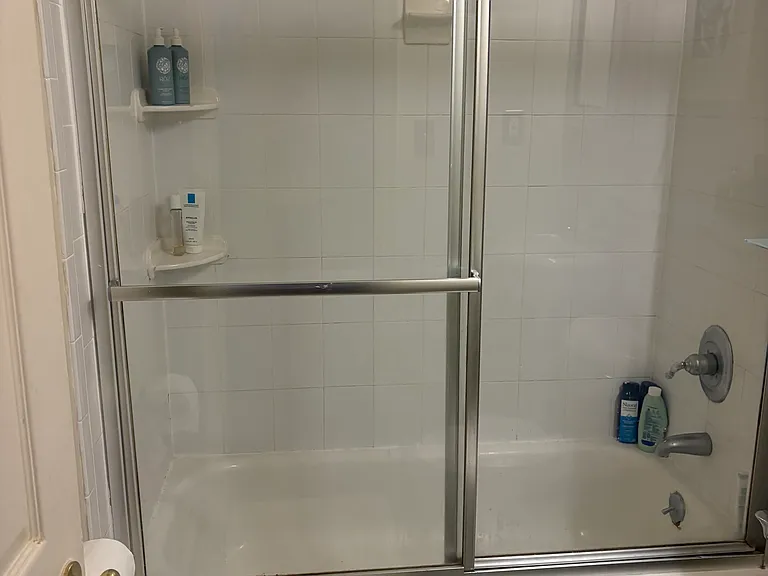 Full tub and shower. River tile floor. Designer sink.