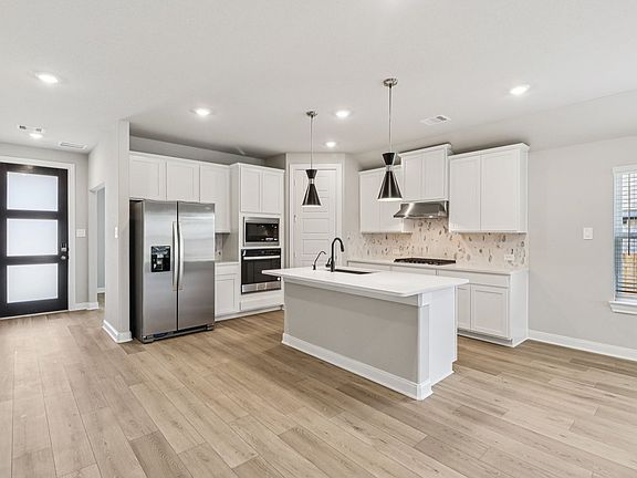 The Oleander floorplan in Pine Lake Cove of Montgomery, TX.