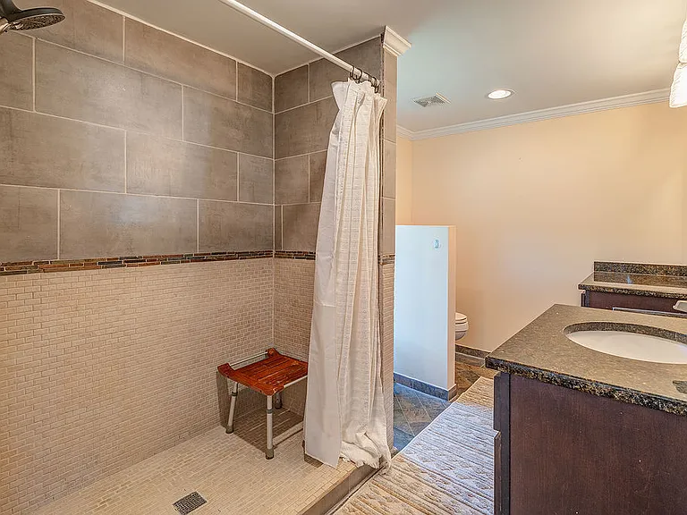 Primary bathroom with easy walk in shower