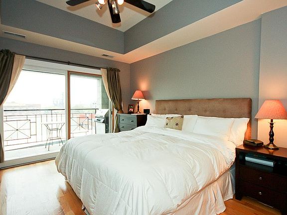 Master Bedroom with Ceiling Fan and Access to Terrace