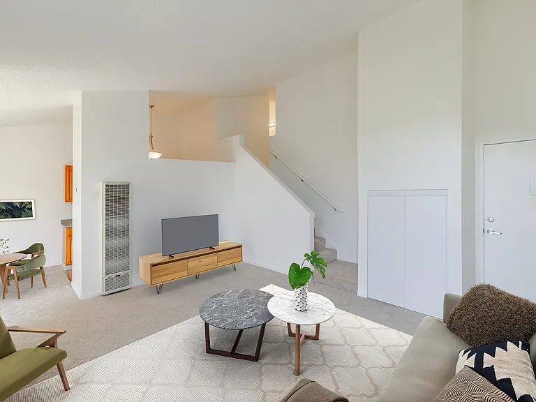 Bright, sunlit living room.