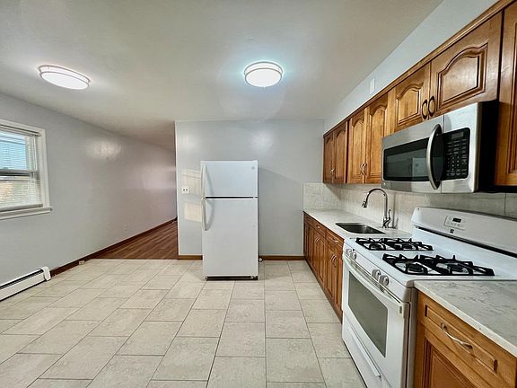 Eat-in Kitchen
Fridge & Over-the-Range Microwave Provided