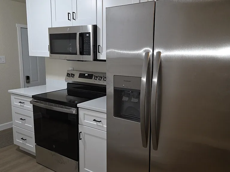 Water and Ice dispenser in refrigerator door.