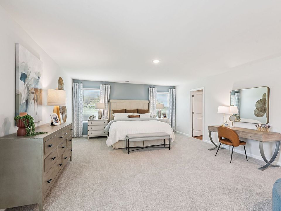 Primary bedroom in the Taylorsville floorplan at a Meritage Homes community in Mebane, NC.