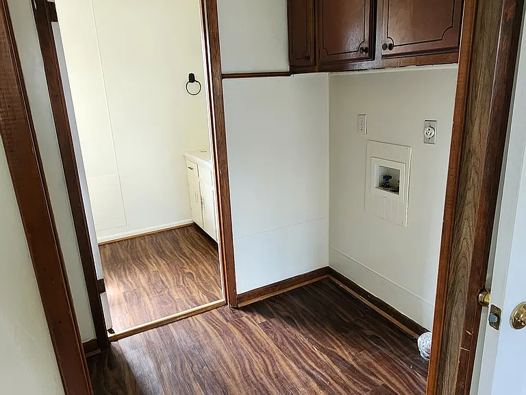 Washer/dryer hookups, adjacent to master bedroom.