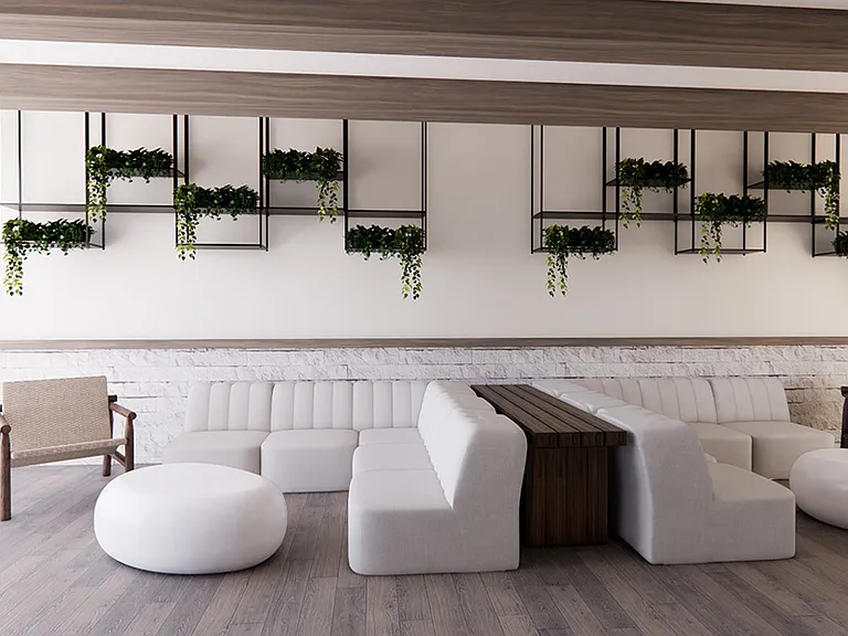 Modern and inviting, our breezeways feature plush seating, natural textures and greenery for a calm retreat