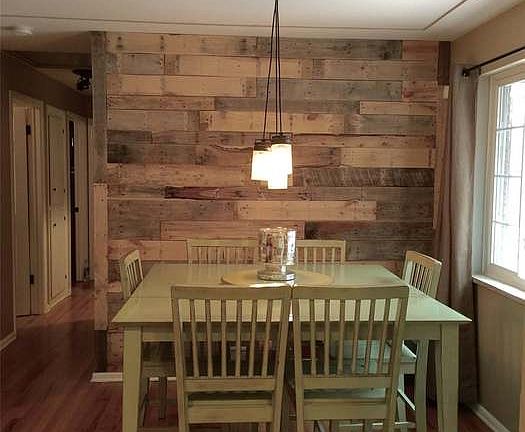 Dining room with amazing wood accent wall