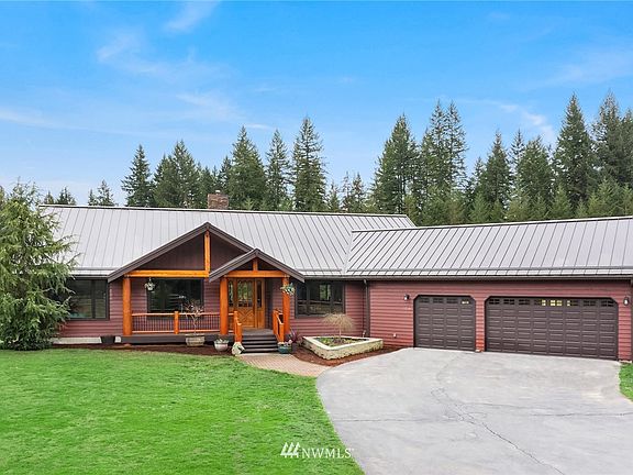 This lodge style home has a new Taylor Metals Roof & new Anderson Windows.