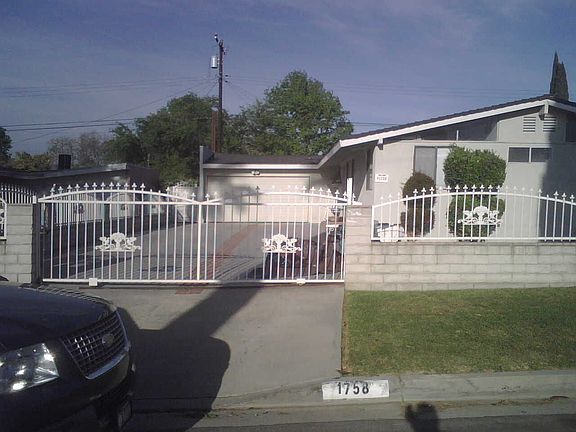 Gate and Slumpstone wall