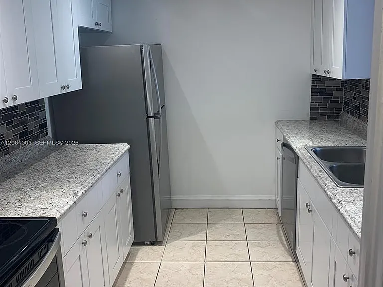 3246 N Pine Island Rd #101 — Photo 9