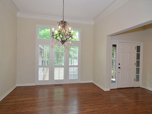 Formal dining has beautiful lighting