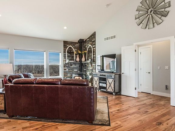 Great Room Vaulted Ceiling and Fireplace with Westerly Views