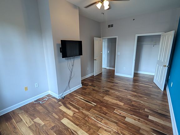 Bedroom with small walk-in closet