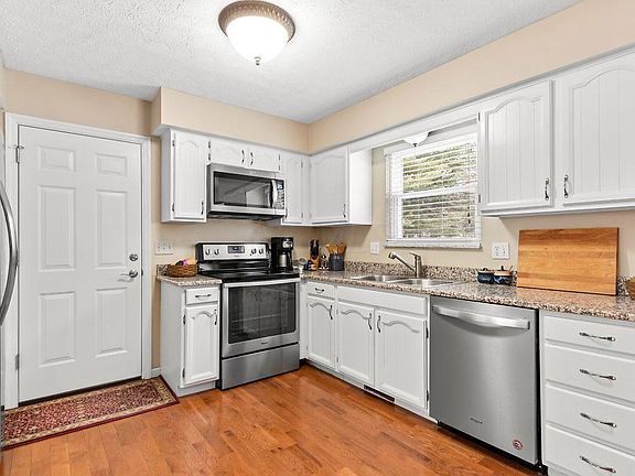 2nd image of 8760 Stonehenge Dr NW