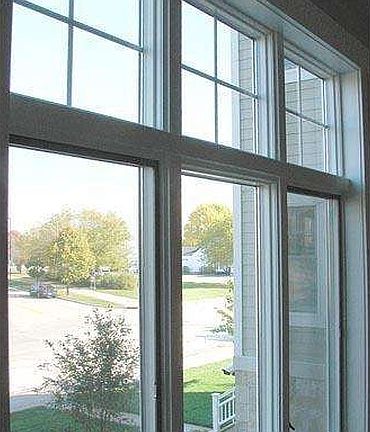 Tall Windows and Wood Blinds