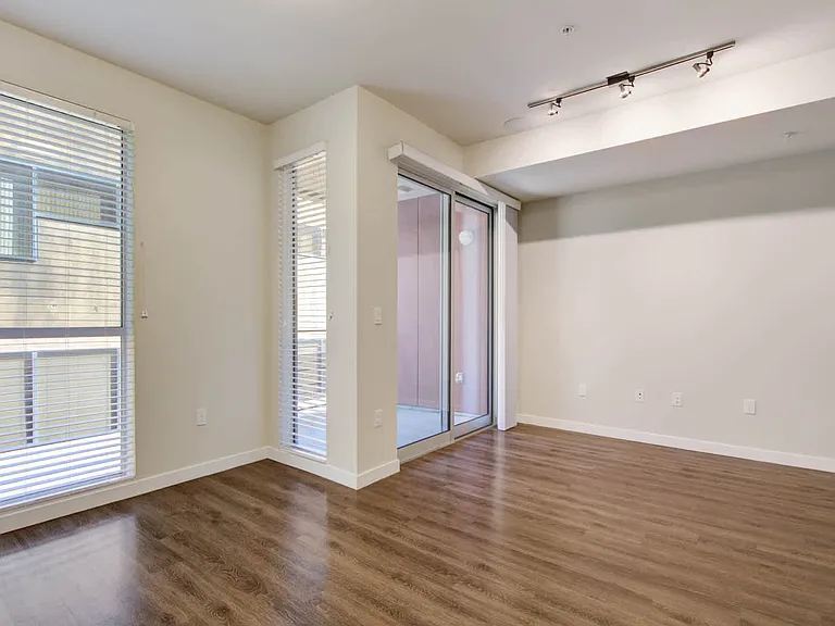 Studio Living Room with Balcony and Hard Surface Flooring