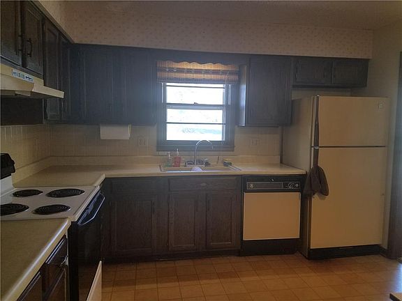Plenty of Cabinets & counter space, & a window above the sink