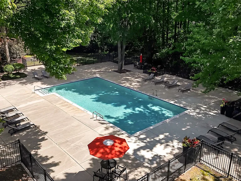 Heated pool with sundeck at Eastwood Village Apartments in Clinton Township, MI.