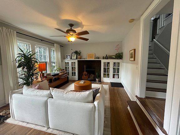 Living with stairway to upstairs bedrooms