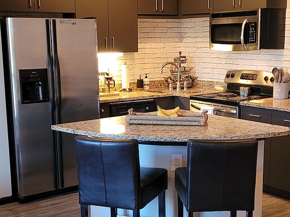 Full Kitchen- Dishwasher, Microwave, Oven, Refrigerator/Freezer, Stove