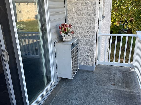 Balcony is you're coming out looking to the left AC unit