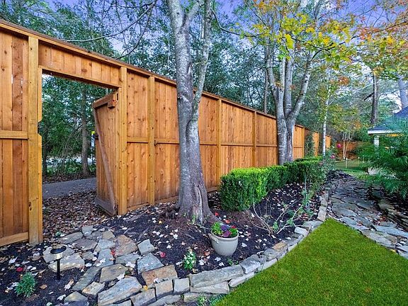 Lush landscaping surrounding a custom privacy wood fence, doorway access trails for daily walks, lakeside park or walking distance to the acclaim Buckalew elementary. It&#x27;s just serene!!!!