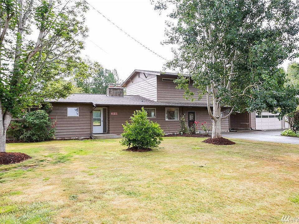 Easy care front yard. View of newly repaired double flu chimney with 10 year warranty.  Roof replaced in 2017. Home is wired for generator.  Could this be your next home?