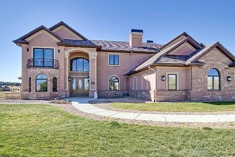 Home located on 2nd tee box of Kings Deer Golf Course