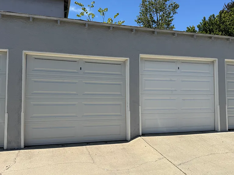 You have your own personal 1-car garage . . there is ample street parking as well