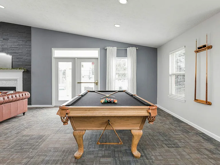 A friendly game of pool is just steps from home. No quarters needed, just good company.