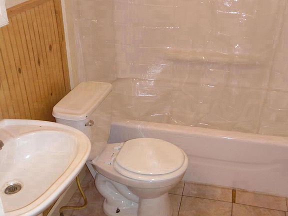Bath with tub and shower combination