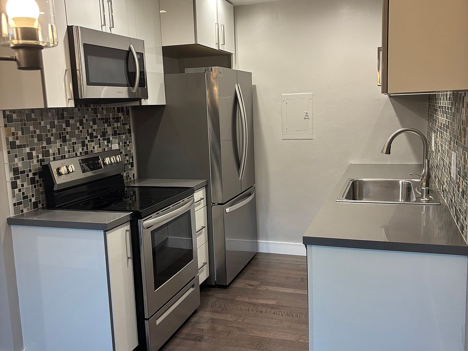 Kitchen with brand new refrigerator