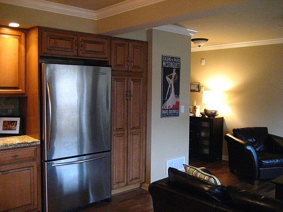 Turn corner & down the hall ther's a full bath w/ laundry & storage!  