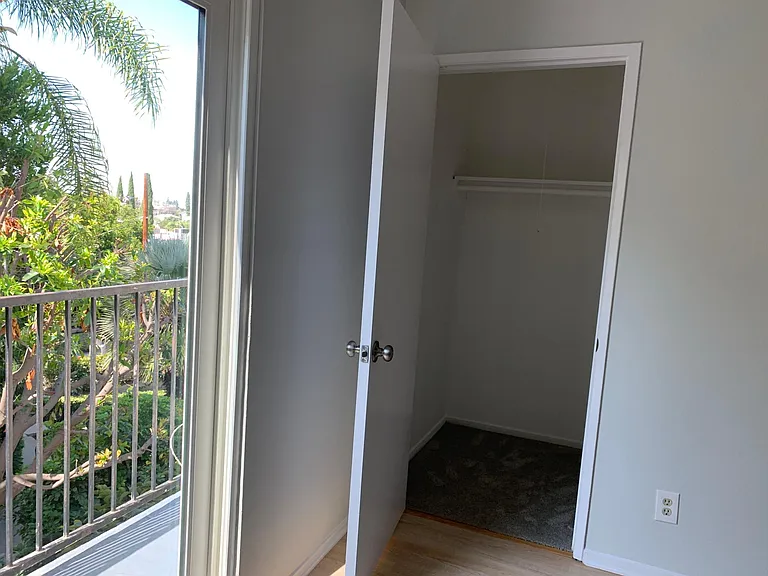 Closet next to balcony