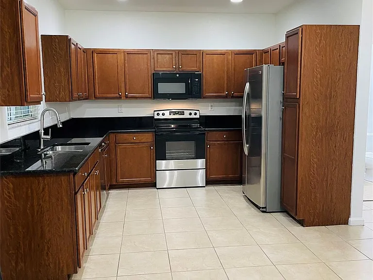 3202 NW 31st Ter #3202 — Photo 6