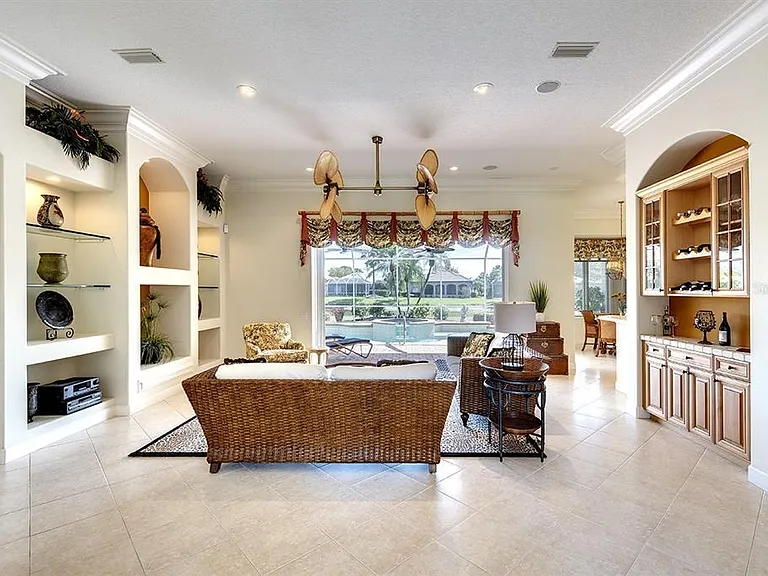 living room with a pool view