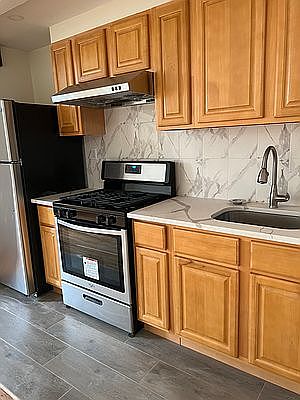 5th image of 8861 18th Ave