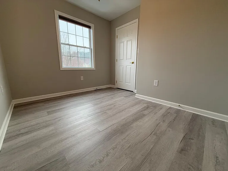 Bedroom # 2 with natural light with closet space