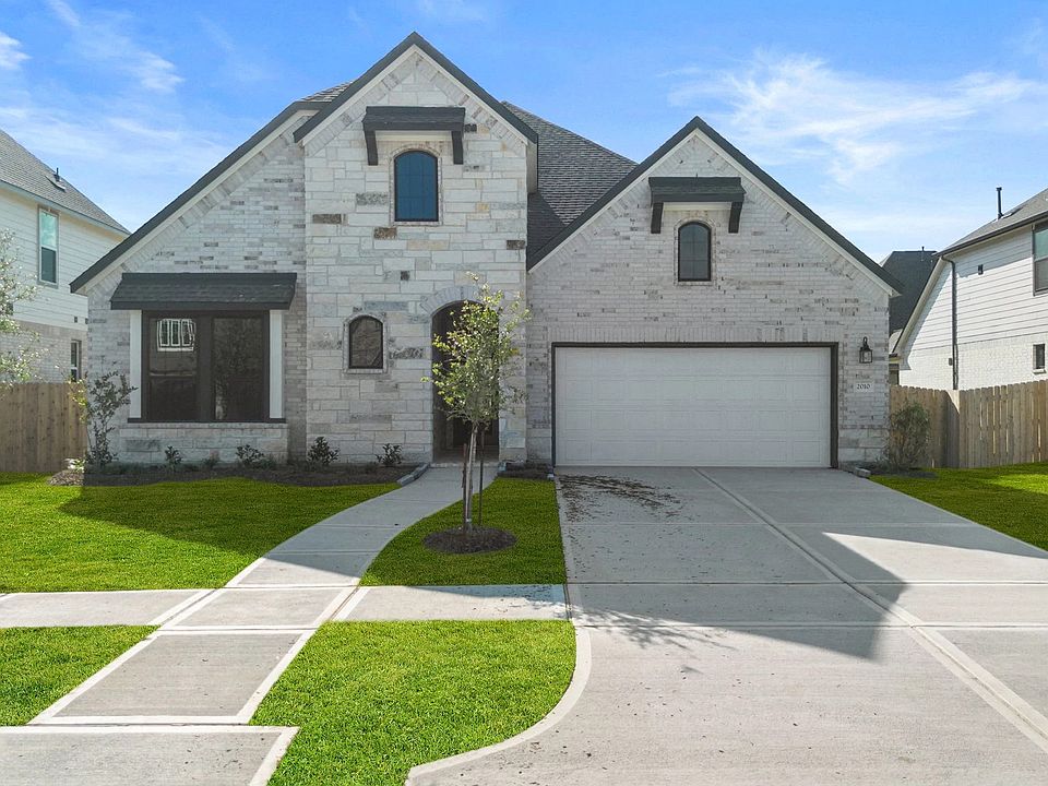 Welcome home to 2010 Quarry Harbor Drive located in the community of StoneCreek Estates zoned to Lam
