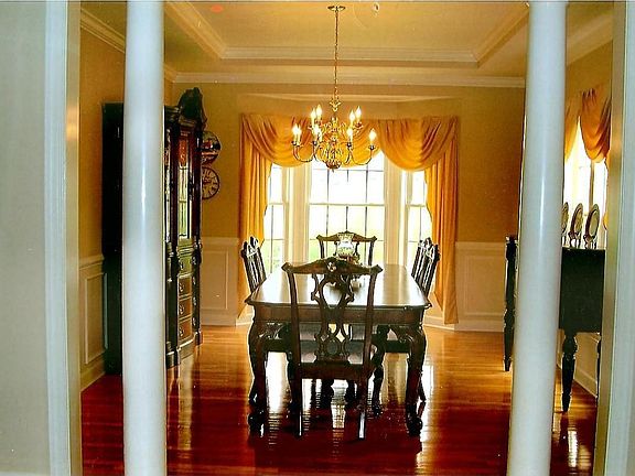 dining room with coffered ceilings 