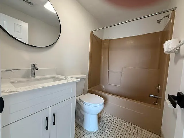 bathroom with new vanity,sink,commode