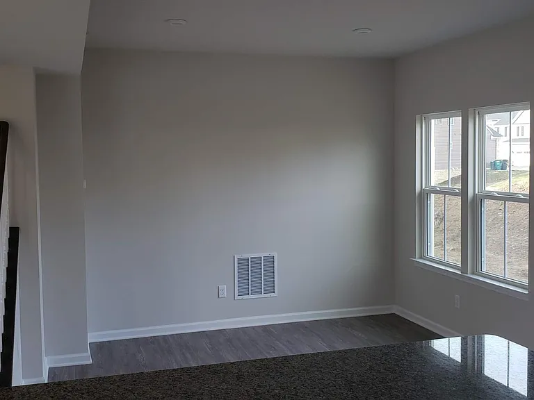 kitchen and dining room with access to back yard