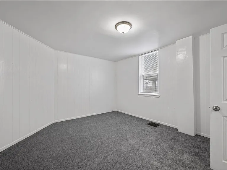 5556-5558 Pocusset St — Photo 8