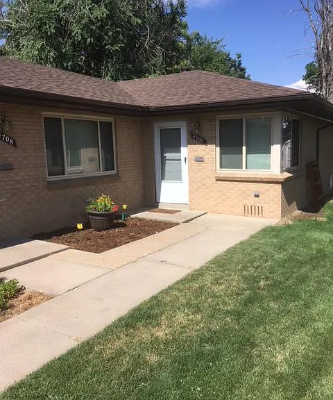 Front view of duplex unit, rear with fenced back yard.