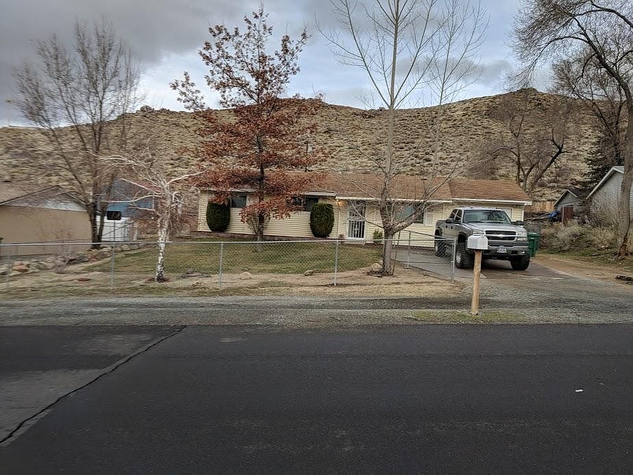 Front of house is fully fenced, room to park along side of house.